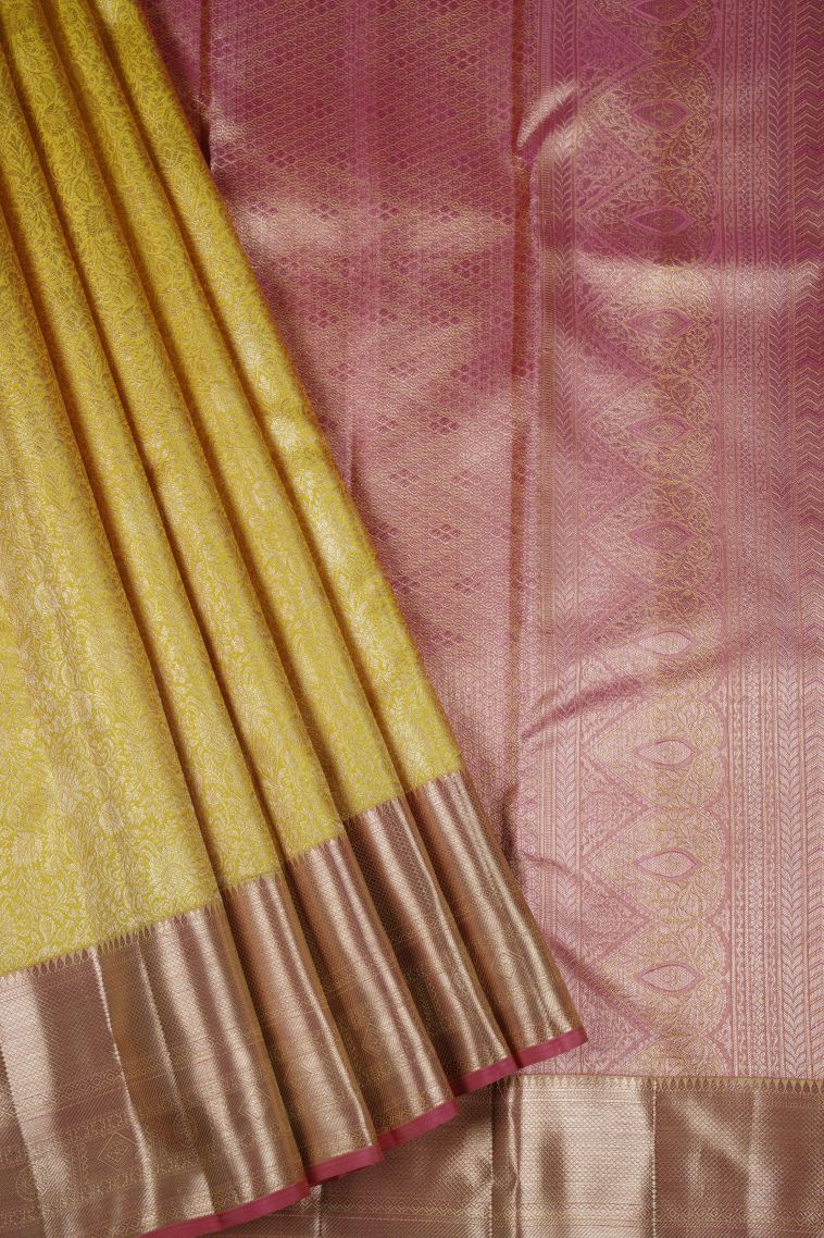 Yellow Kanchipuram Silk Sarees with Copper Zari Floral Patterns view 1