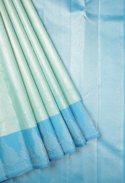 Sky Blue Kanchipuram Silk Sarees with Silver Zari Floral Patterns