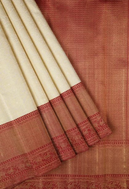 White Kanchipuram Silk Sarees with Gold Zari Floral Patterns