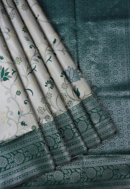 Pistachio Green Apoorva Silk Sarees with Silver Zari Floral Patterns