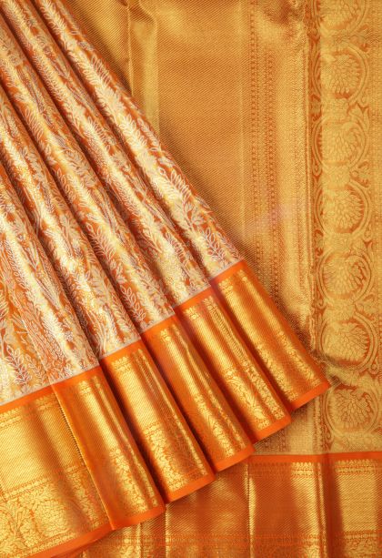 Carrot Orange Kanchipuram Silk Sarees with Gold Zari Floral Patterns