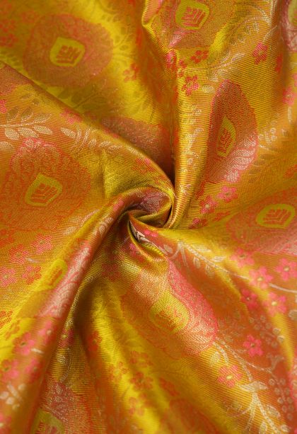 Honey Orange Kanchipuram Silk Sarees with Silver Zari Floral Patterns