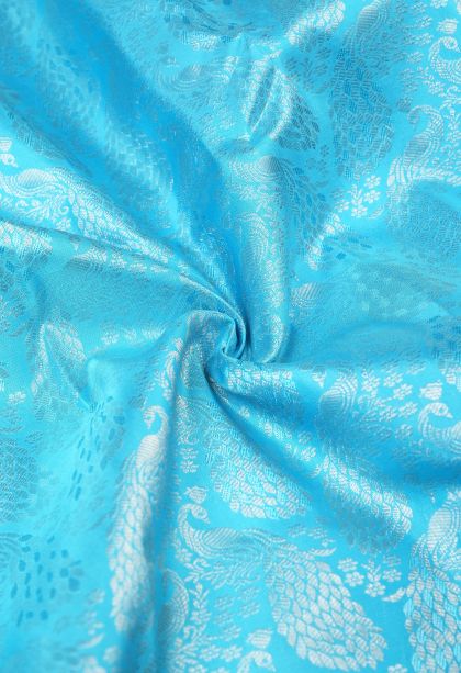 Arctic Blue Kanchipuram Silk Sarees with Silver Zari Floral Patterns
