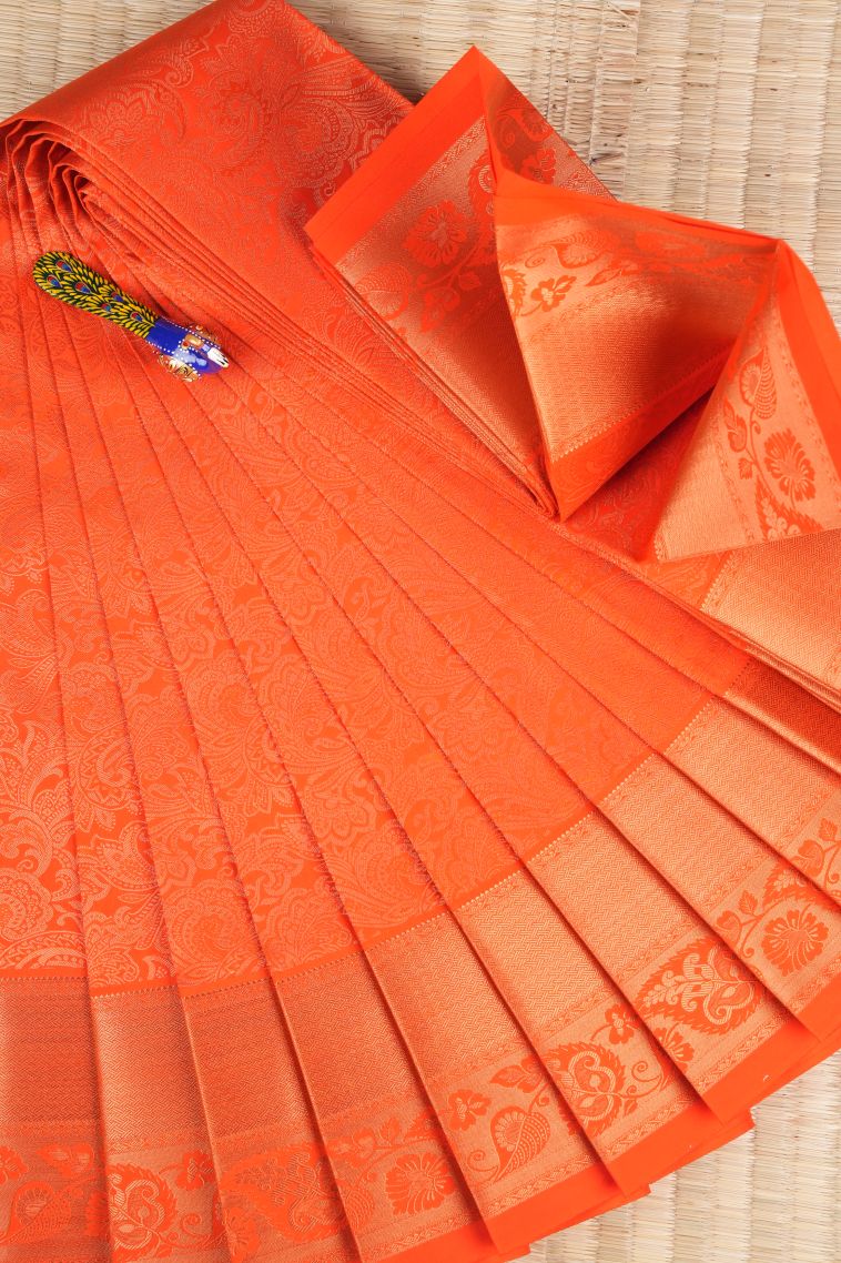 Tiger Orange Visiri Madippu Silk Sarees with Copper Zari Floral Patterns view 1