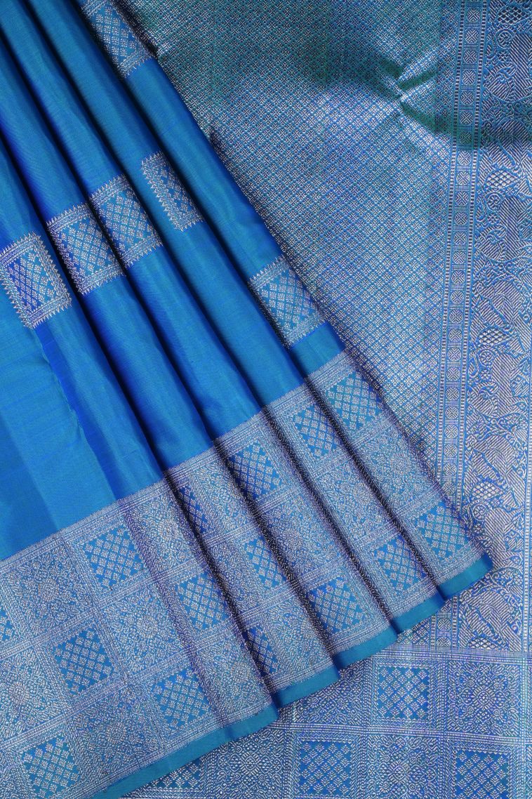Peacock Blue Kanchipuram Silk Sarees with Silver Zari Buttis (small Dots Or Motifs) view 1