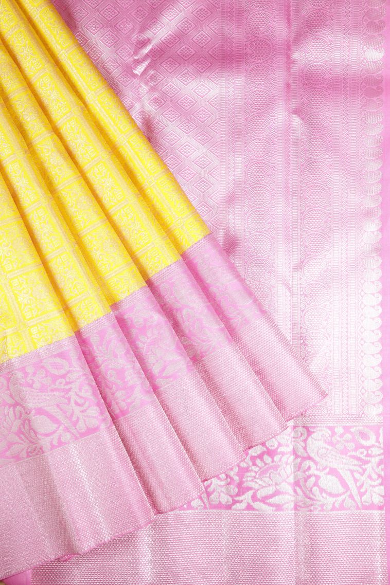 Lemon Yellow Kanchipuram Silk Sarees with Silver Zari Floral Patterns view 1
