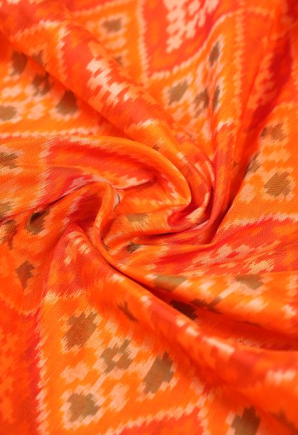 Tiger Orange Ikkat Silk with Without Zari Zari Geometric Shapes