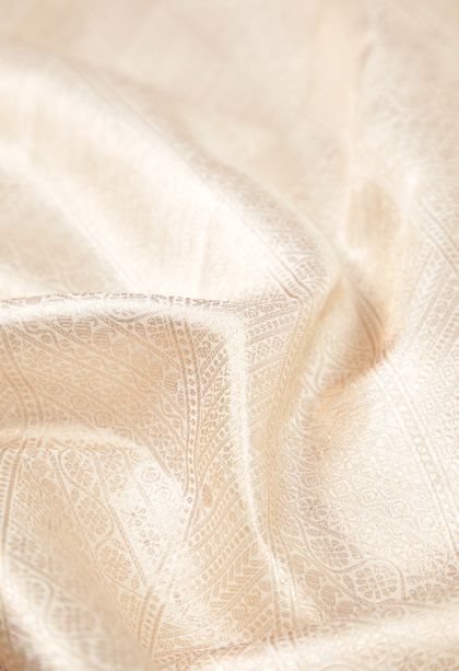 Cream White Kanchipuram Silk Sarees with Gold Zari Floral Patterns