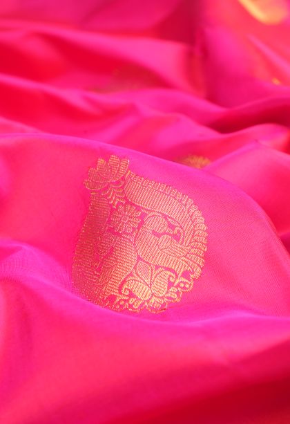 Fuscia Pink Kanchipuram Silk Sarees with Gold Zari Peacock Motifs