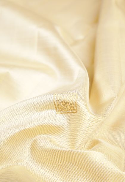 Cream White Kanchipuram Silk Sarees with Gold Zari Buttis (small Dots Or Motifs)
