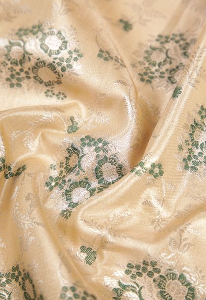 Cream White Tissue Silk Sarees with Silver Zari Floral Patterns