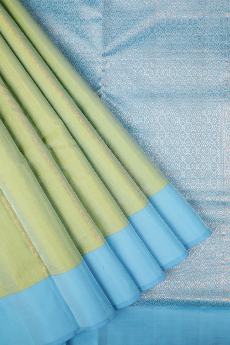 Mint Green Soft Silk Saree with Copper Zari Stripes view 1