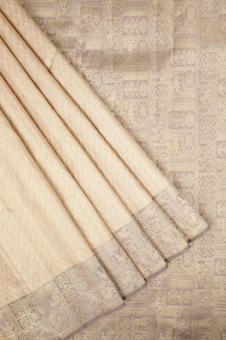 Cream White Kanchipuram Silk Sarees with Gold Zari Buttis (small Dots Or Motifs) view 1