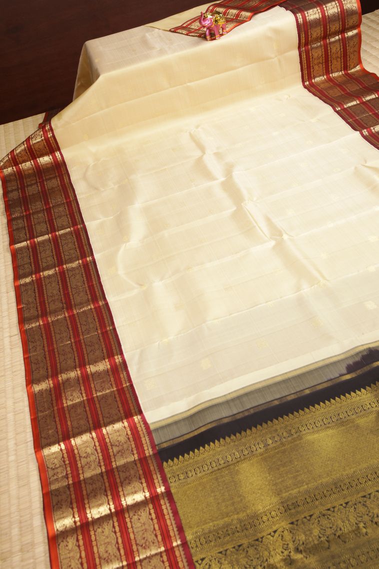 Cream White Kanchipuram Silk Sarees with Gold Zari Buttis (small Dots Or Motifs) view 2