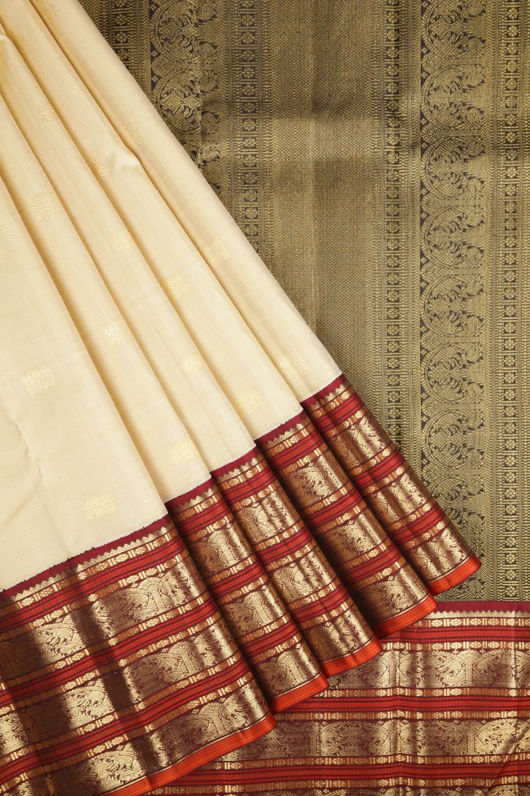 Cream White Kanchipuram Silk Sarees with Gold Zari Buttis (small Dots Or Motifs) view 1
