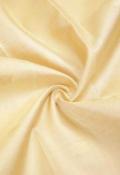 Cream White Kanchipuram Silk Sarees with Gold Zari Buttis (small Dots Or Motifs)