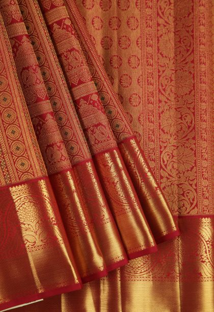 Dawn Red Kanchipuram Silk Sarees with Gold Zari Peacock Motifs
