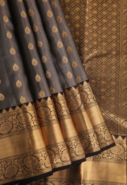 Damp Black Soft Silk Saree with Gold Zari Thilagam Puttas