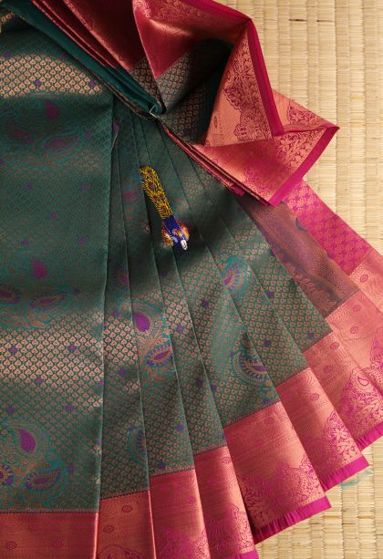 Pine Green Visiri Madippu Silk Sarees with Copper Zari Floral Patterns