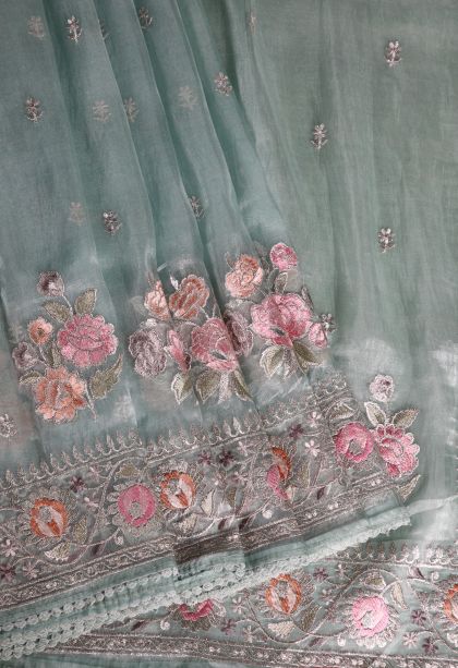 Sapphire Blue Organza Saree with Silver Zari Floral Patterns