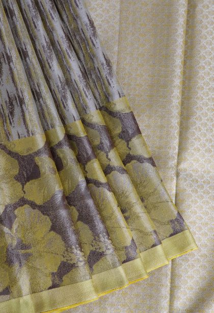 Granola Yellow Kanchipuram Silk Sarees with Gold And Silver Zari Floral Patterns