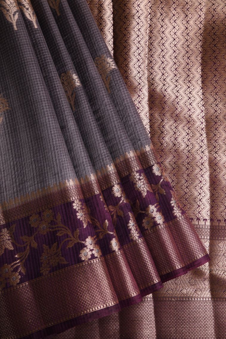 Damp Black Jute Sarees with Gold Zari Floral Puttas view 1