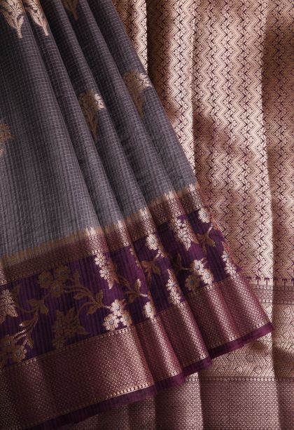 Damp Black Jute Sarees with Gold Zari Floral Puttas