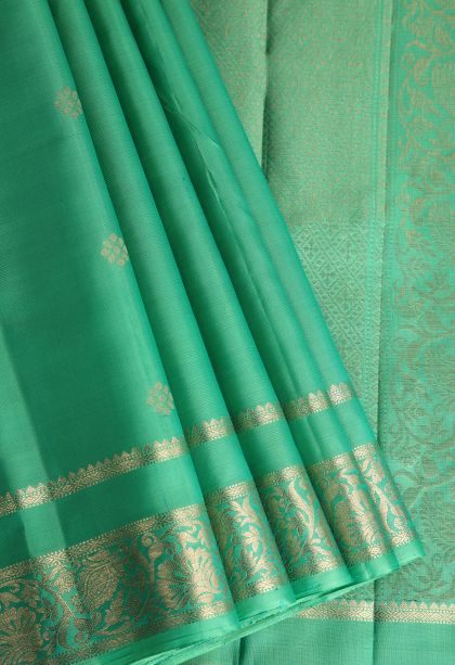 Seafoam Green Soft Silk Saree with Gold Zari Floral Puttas