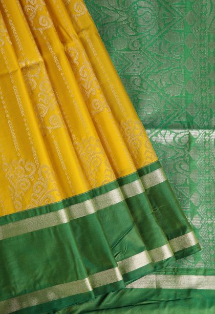 Lemon Yellow Visiri Madippu Silk Sarees with Silver Zari Floral Puttas