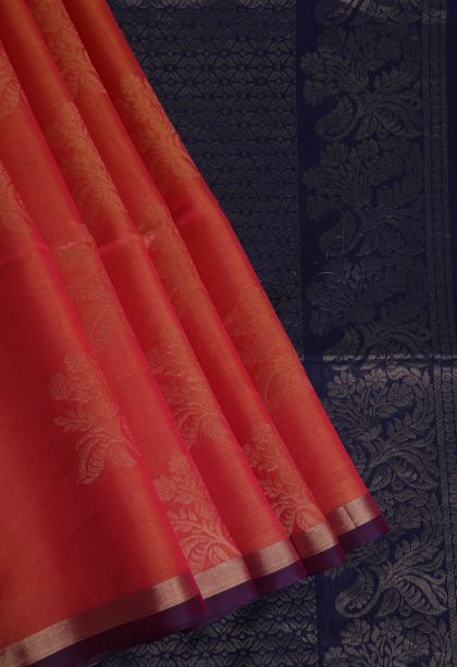 Carrot Orange Silk Cotton Sarees with Gold Zari Floral Patterns