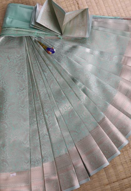 Sky Blue Tissue Silk Sarees with Copper Zari Floral Patterns