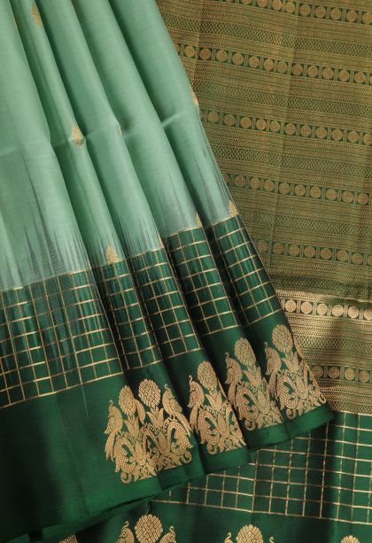 Mint Green Soft Silk Saree with Gold Zari Buttis (small Dots Or Motifs)