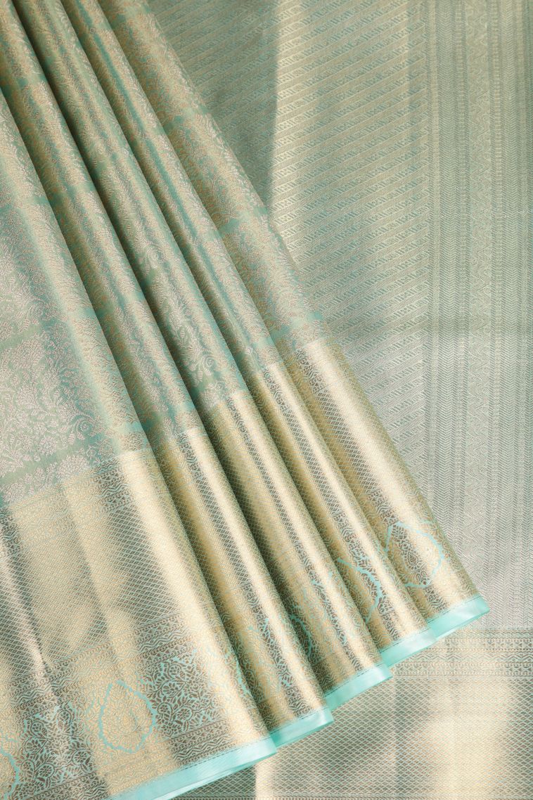 Mint Green Tissue Silk Sarees with Gold Zari Floral Patterns view 1