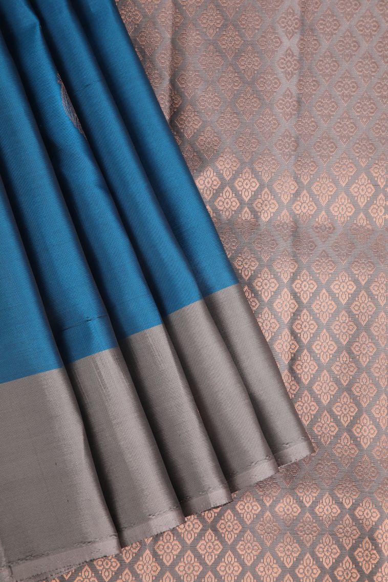 Cerulean Blue Soft Silk Saree with Copper Zari Floral Puttas view 1