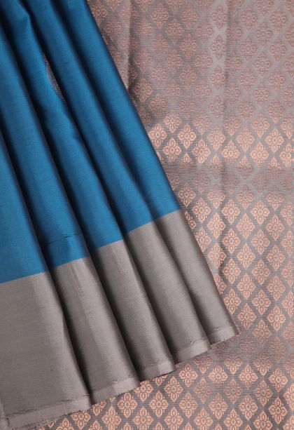 Cerulean Blue Soft Silk Saree with Copper Zari Floral Puttas