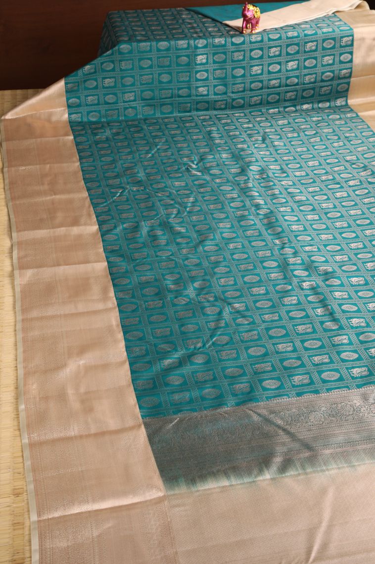 Cerulean Blue Apoorva Silk Sarees with Silver Zari Floral Puttas view 2