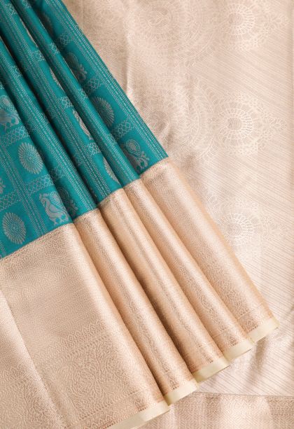 Cerulean Blue Apoorva Silk Sarees with Silver Zari Floral Puttas