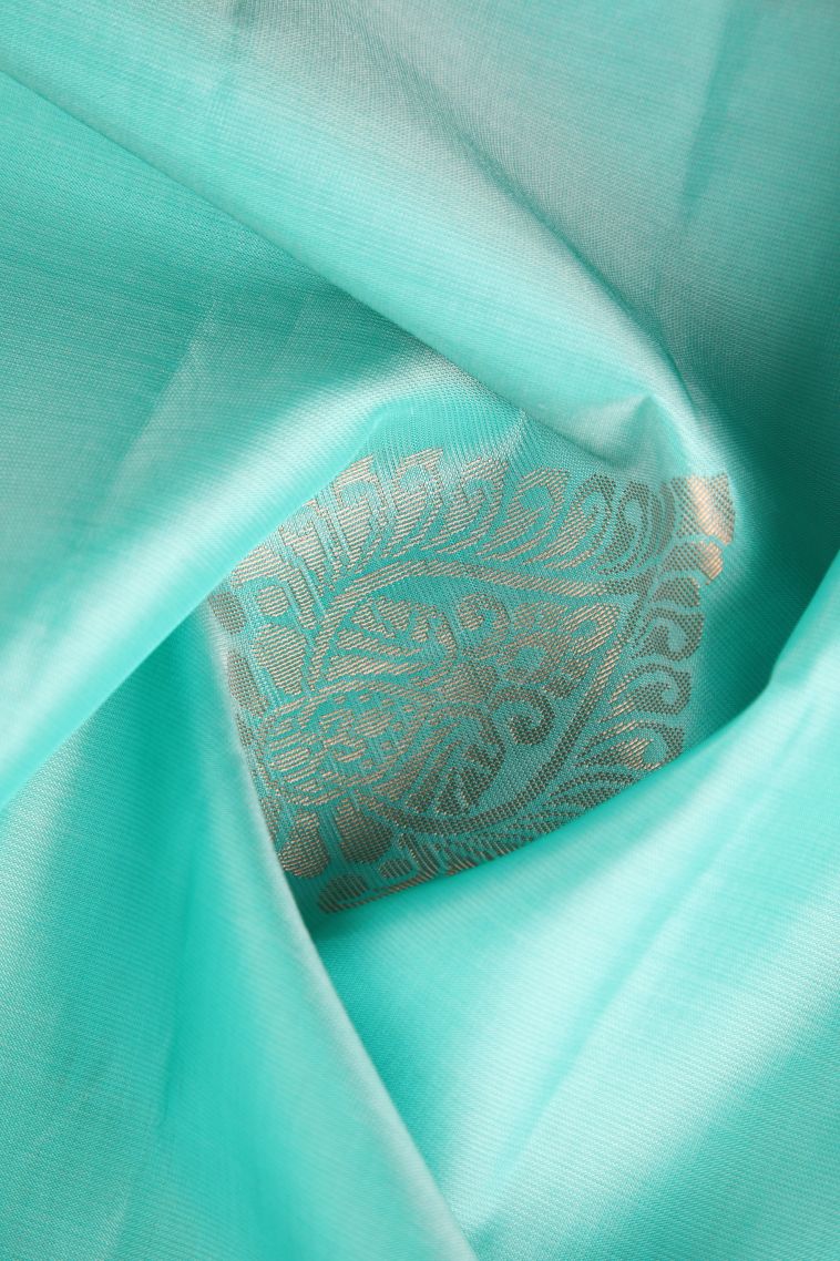 Arctic Blue Soft Silk Saree with Copper Zari Floral Puttas view 4