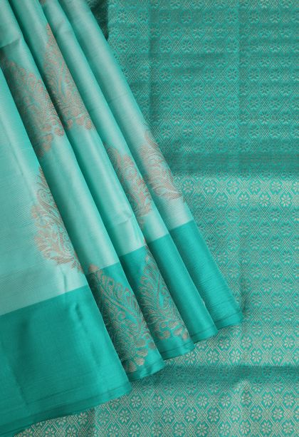 Arctic Blue Soft Silk Saree with Copper Zari Floral Puttas