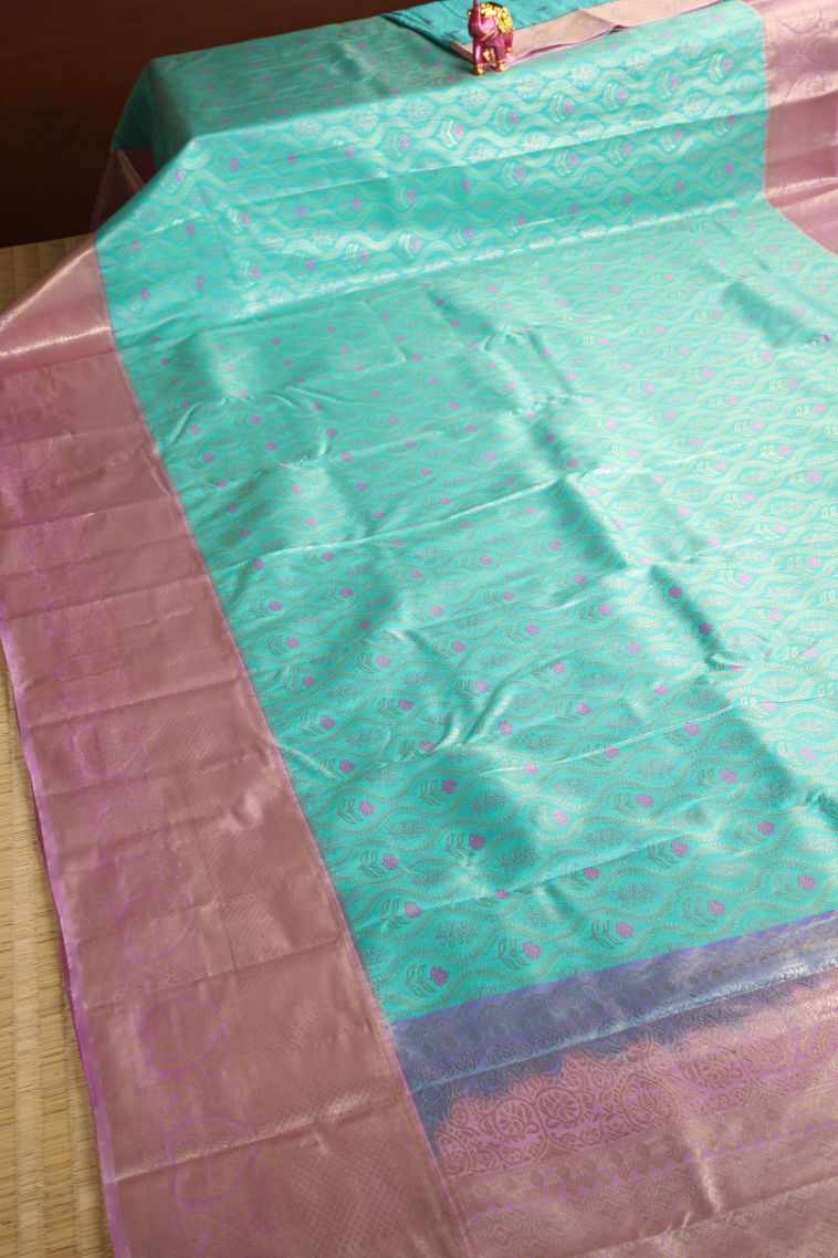 Arctic Blue Tissue Silk Sarees with Gold Zari Floral Patterns view 2