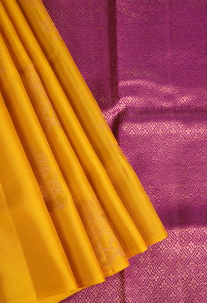 Merigold Orange Soft Silk Saree with Copper Zari Floral Puttas