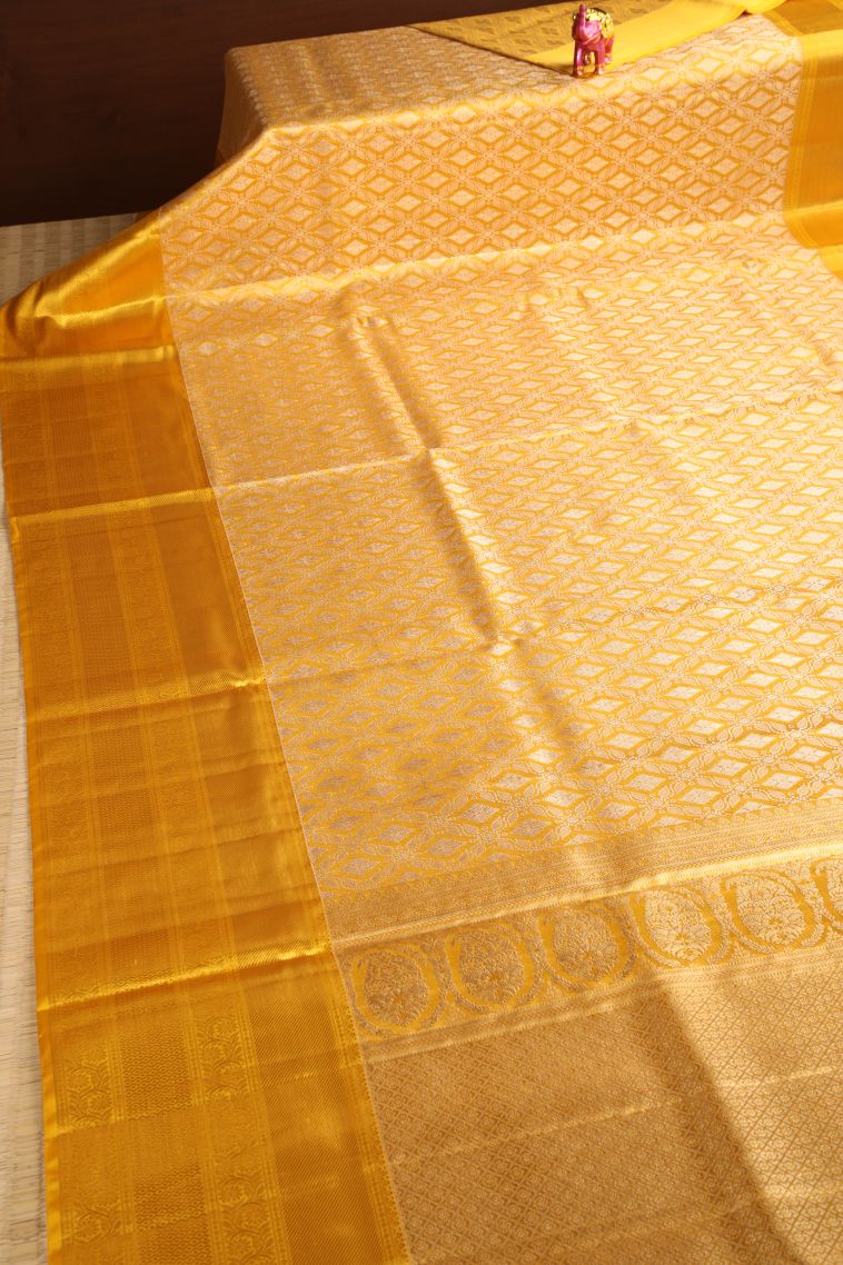 Beige Yellow Kanchipuram Silk Sarees with Gold Zari Floral Patterns view 2
