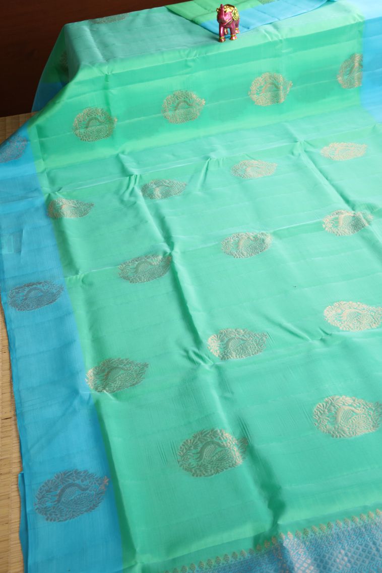 Mint Green Soft Silk Saree with Copper Zari Peacock Motifs view 2