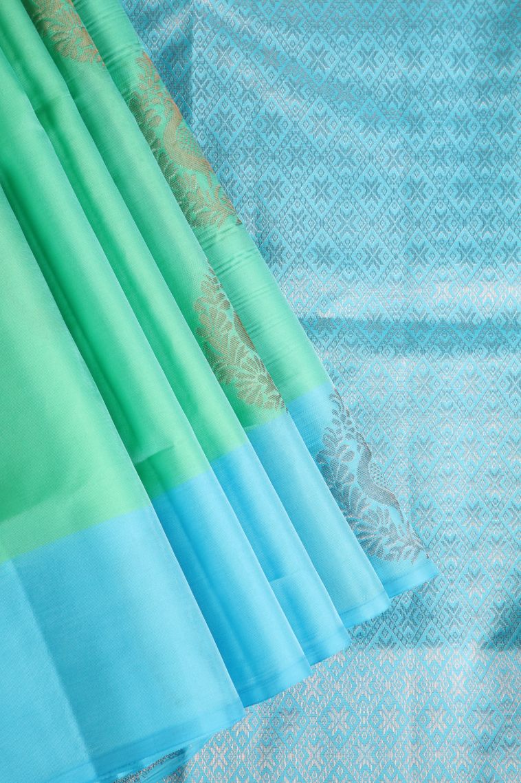 Mint Green Soft Silk Saree with Copper Zari Peacock Motifs view 1