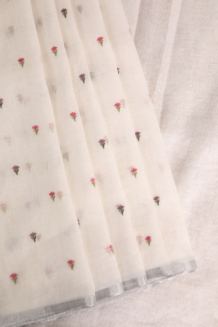 Alabaster White Linen Saree with Without Zari Zari Floral Puttas view 1