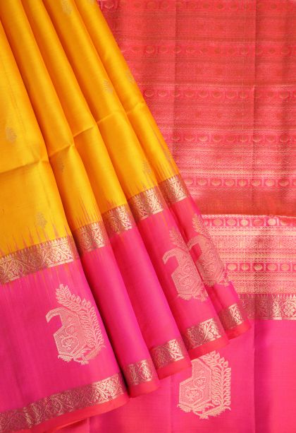 Merigold Orange Soft Silk Saree with Gold Zari Floral Puttas