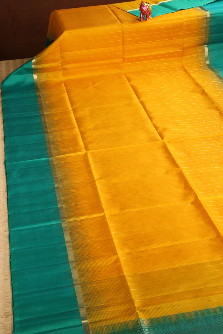 Merigold Orange Soft Silk Saree with Gold Zari Raindrops Model view 2