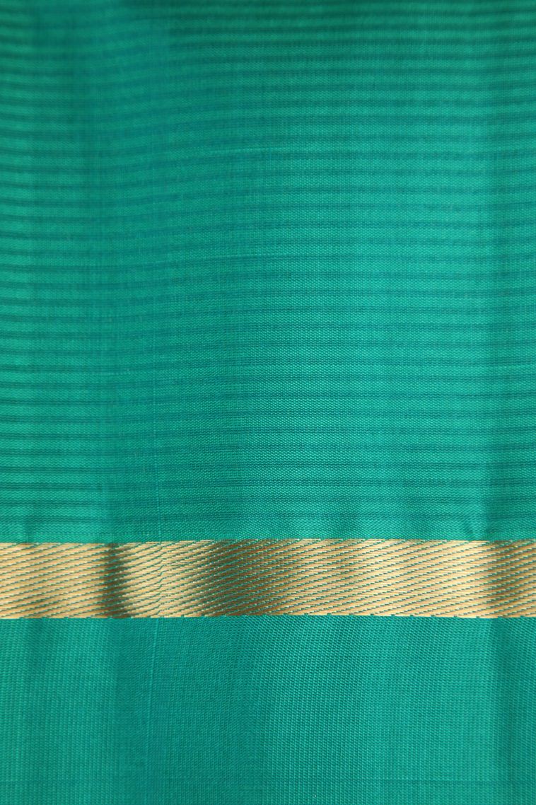 Merigold Orange Soft Silk Saree with Gold Zari Raindrops Model view 3