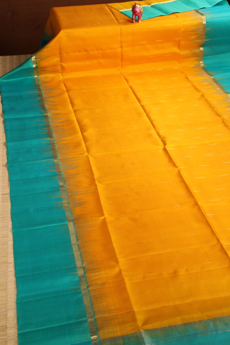 Merigold Orange Soft Silk Saree with Gold Zari Raindrops Model view 2