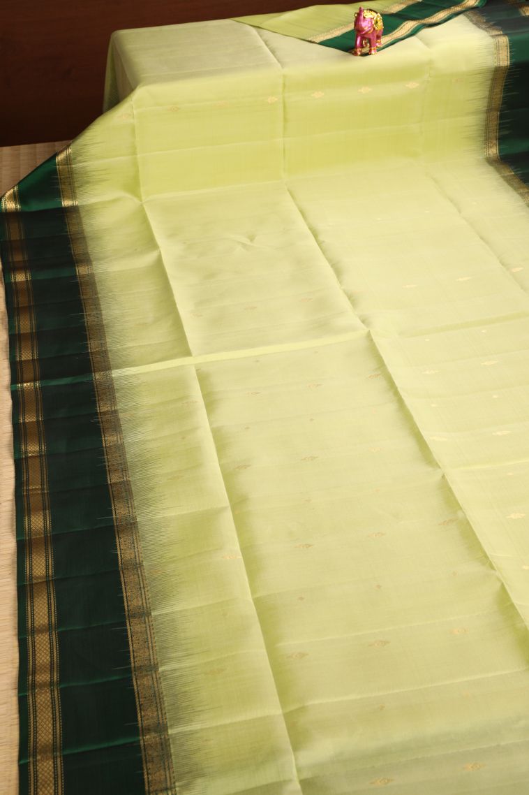 Pickle Green Soft Silk Saree with Gold Zari Floral Puttas view 2